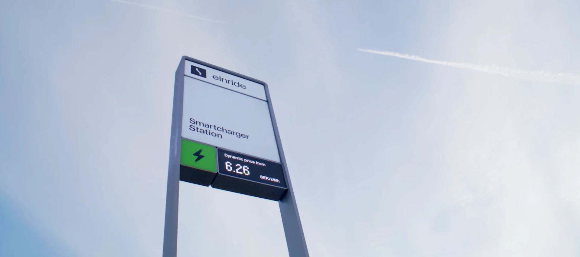 Einride Smartcharger Station sign against a blue sky